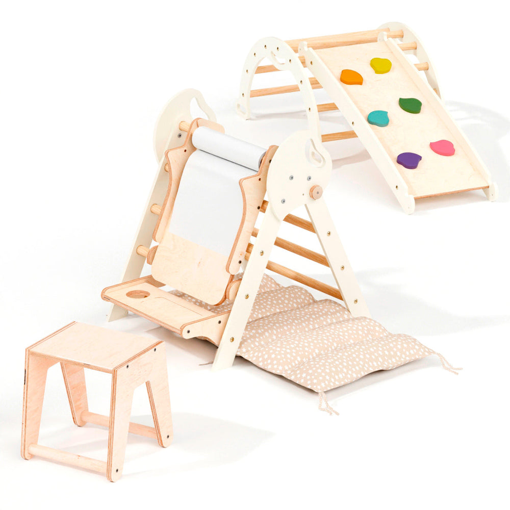 Children's wooden play set with slide, steps, and colorful heart-shaped mat on a white background