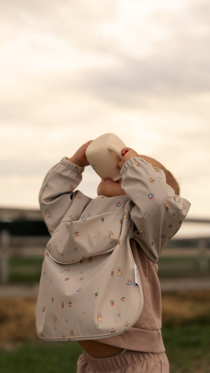 Long-sleeved bib with front pocket