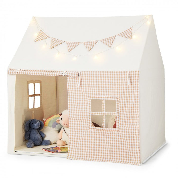 Children's playhouse with toys inside on a white background
